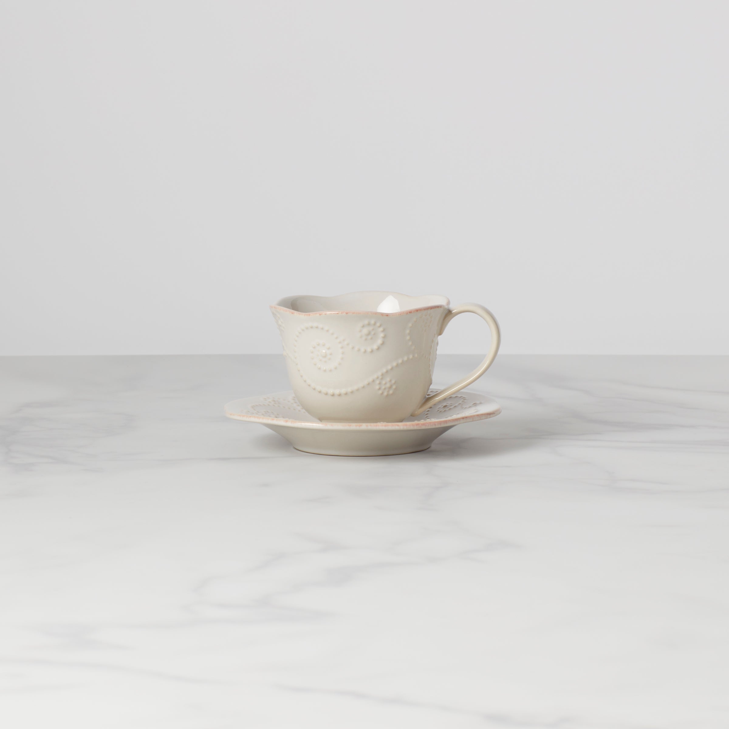 Handcrafted French Perle White Ceramic Cup and Saucer Set