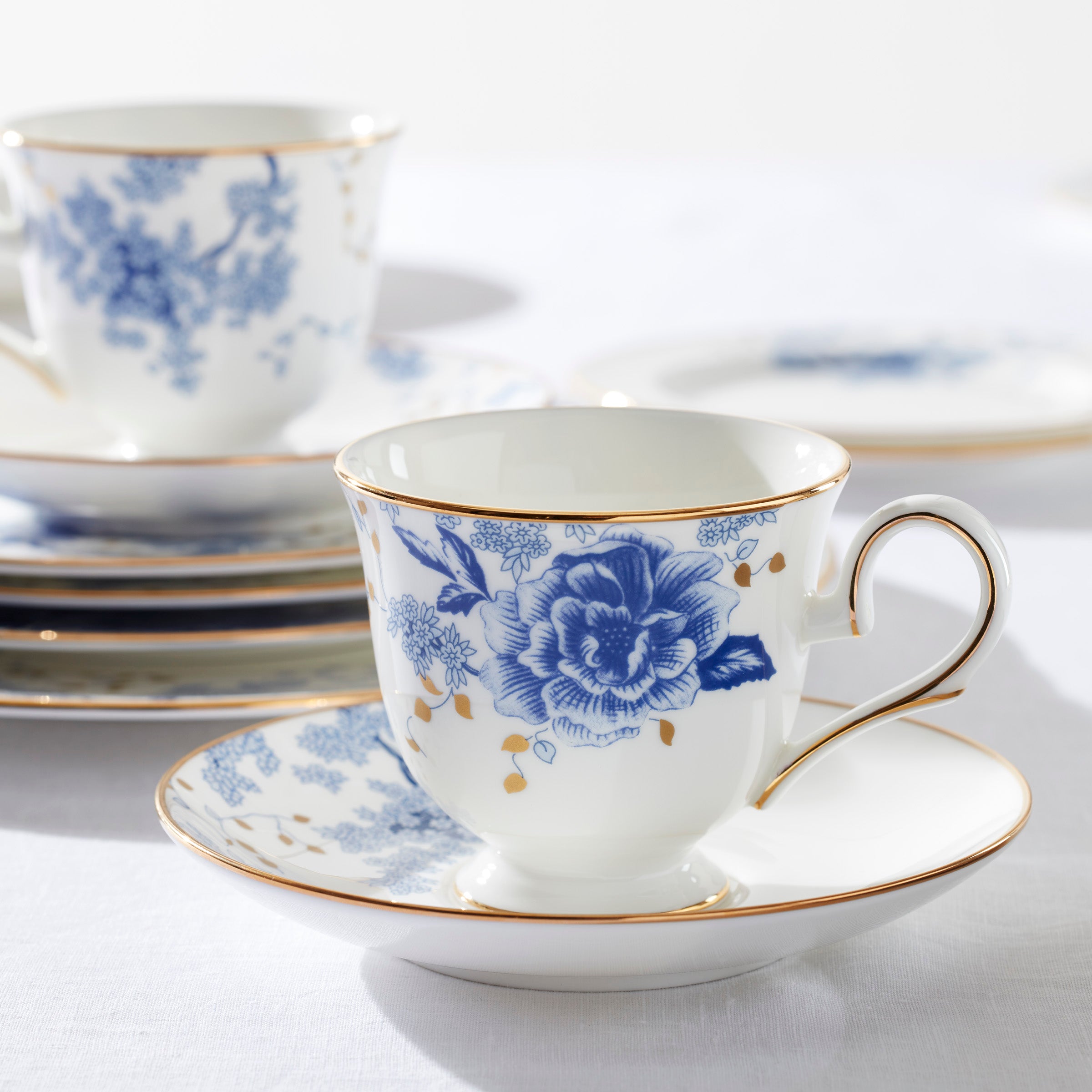 Garden Grove Blue Blossom Bone China Saucer with Gold Trim