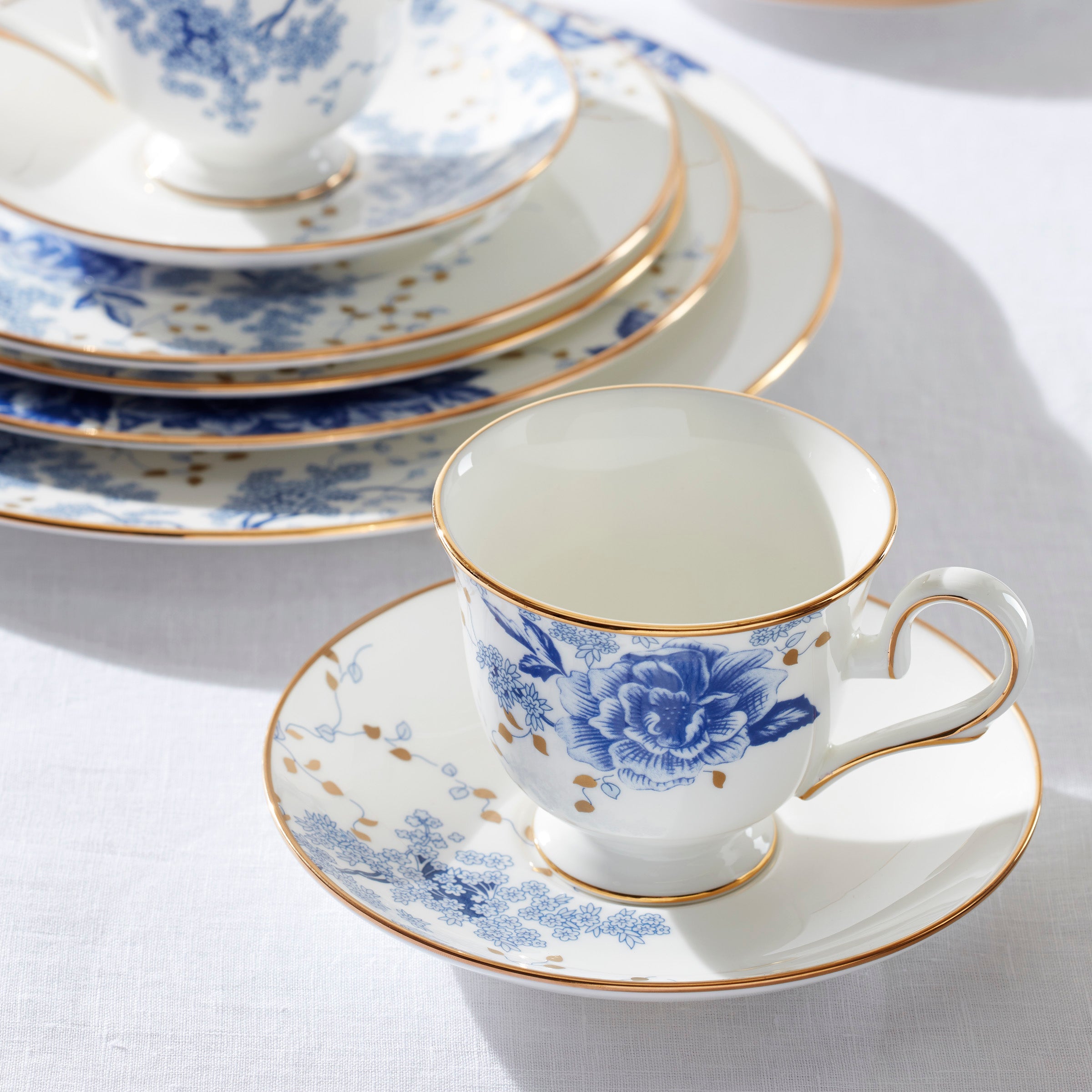 Garden Grove Blue Blossom Bone China Saucer with Gold Trim