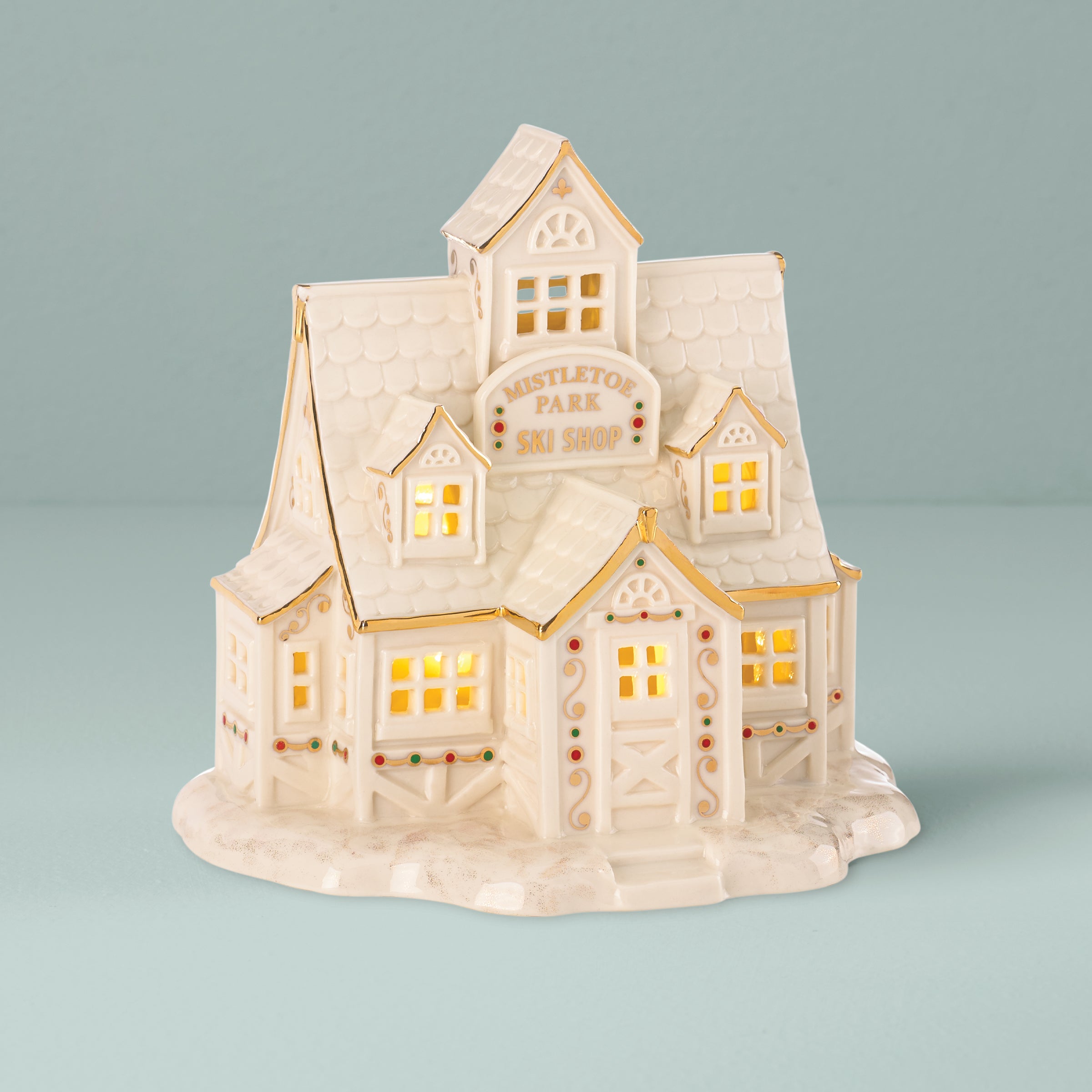 Light-Up Mistletoe Park Ski Shop Figurine with Gold Accents
