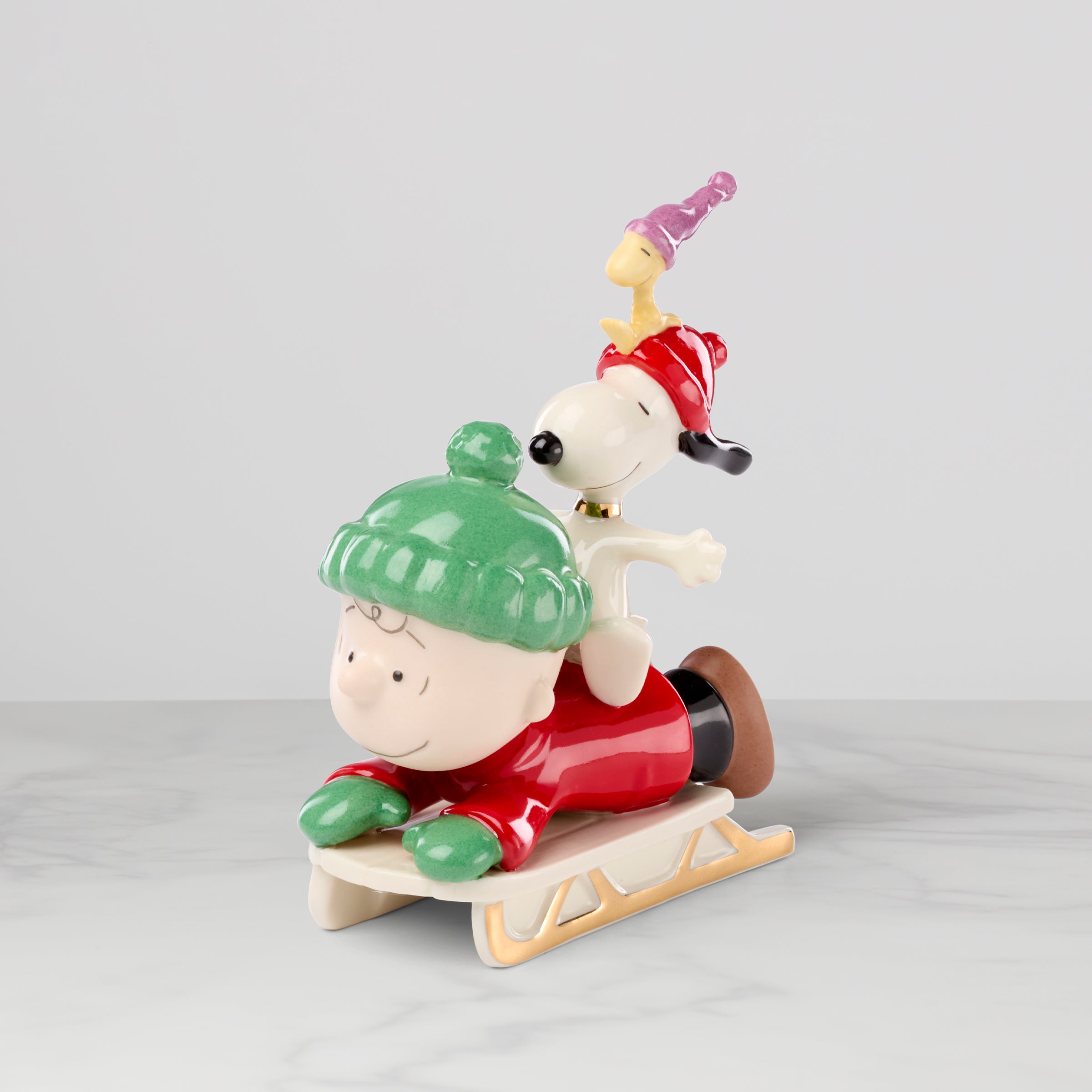 Snoopy Porcelain Figurine - Woodstock & Charlie Brown Sledding