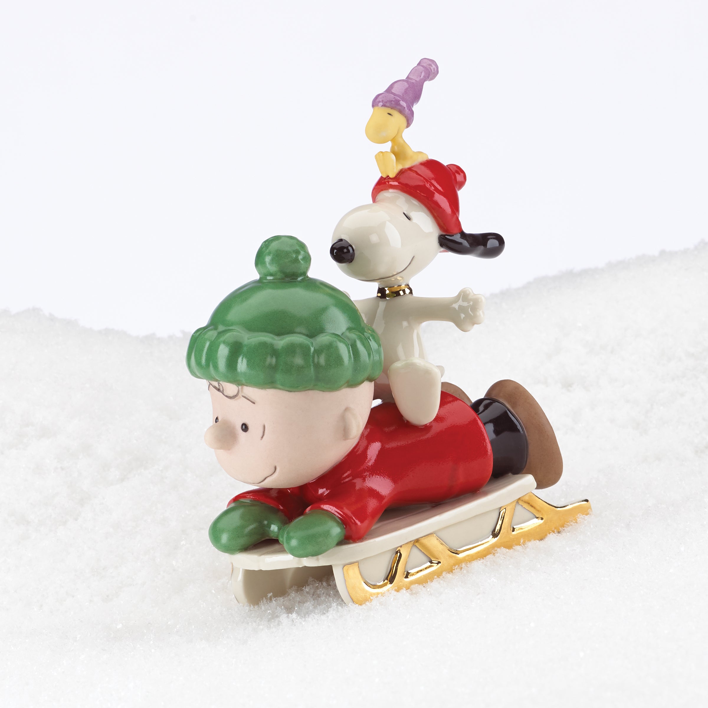 Snoopy Porcelain Figurine - Woodstock & Charlie Brown Sledding