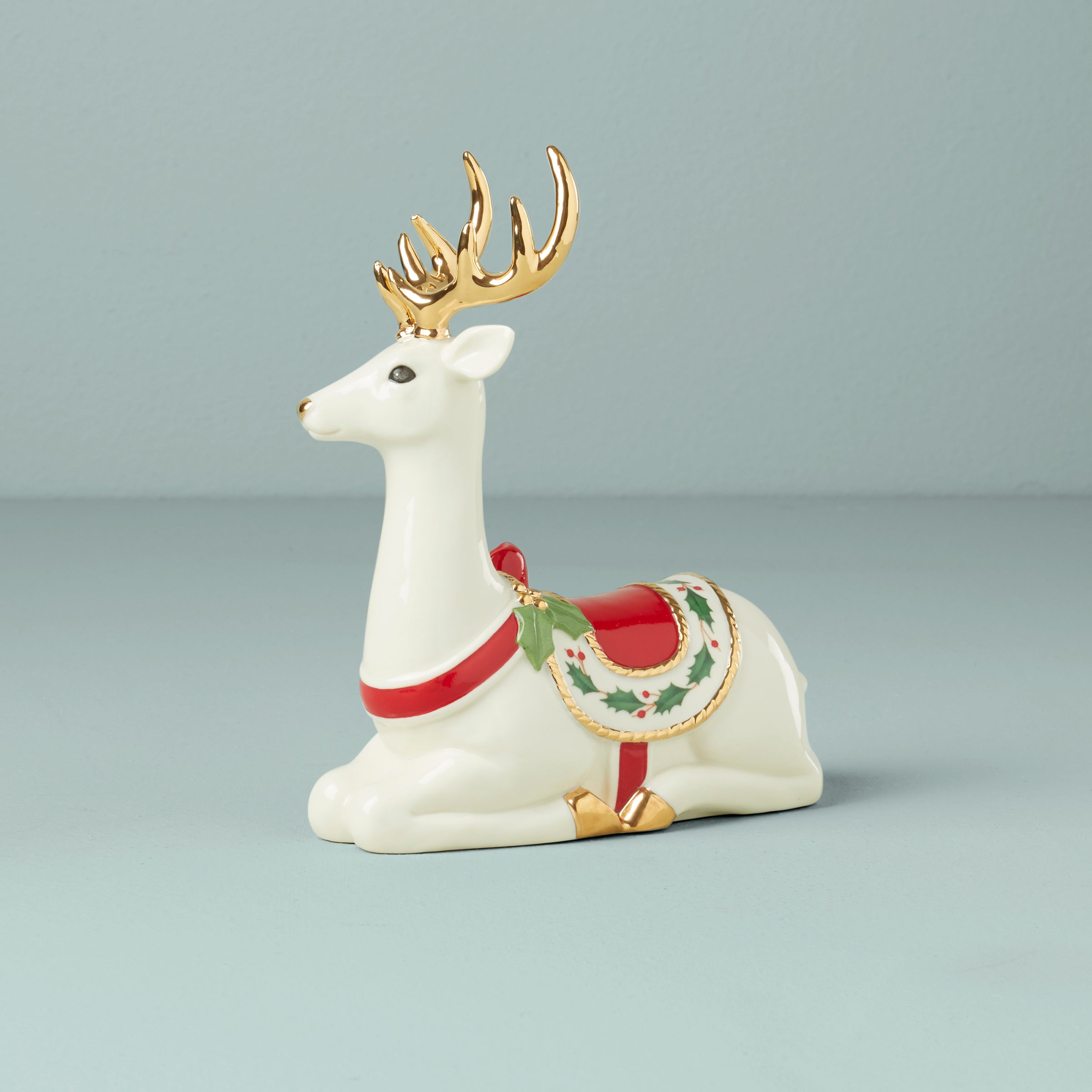 Festive Sitting Reindeer Figurine with Holly Saddle
