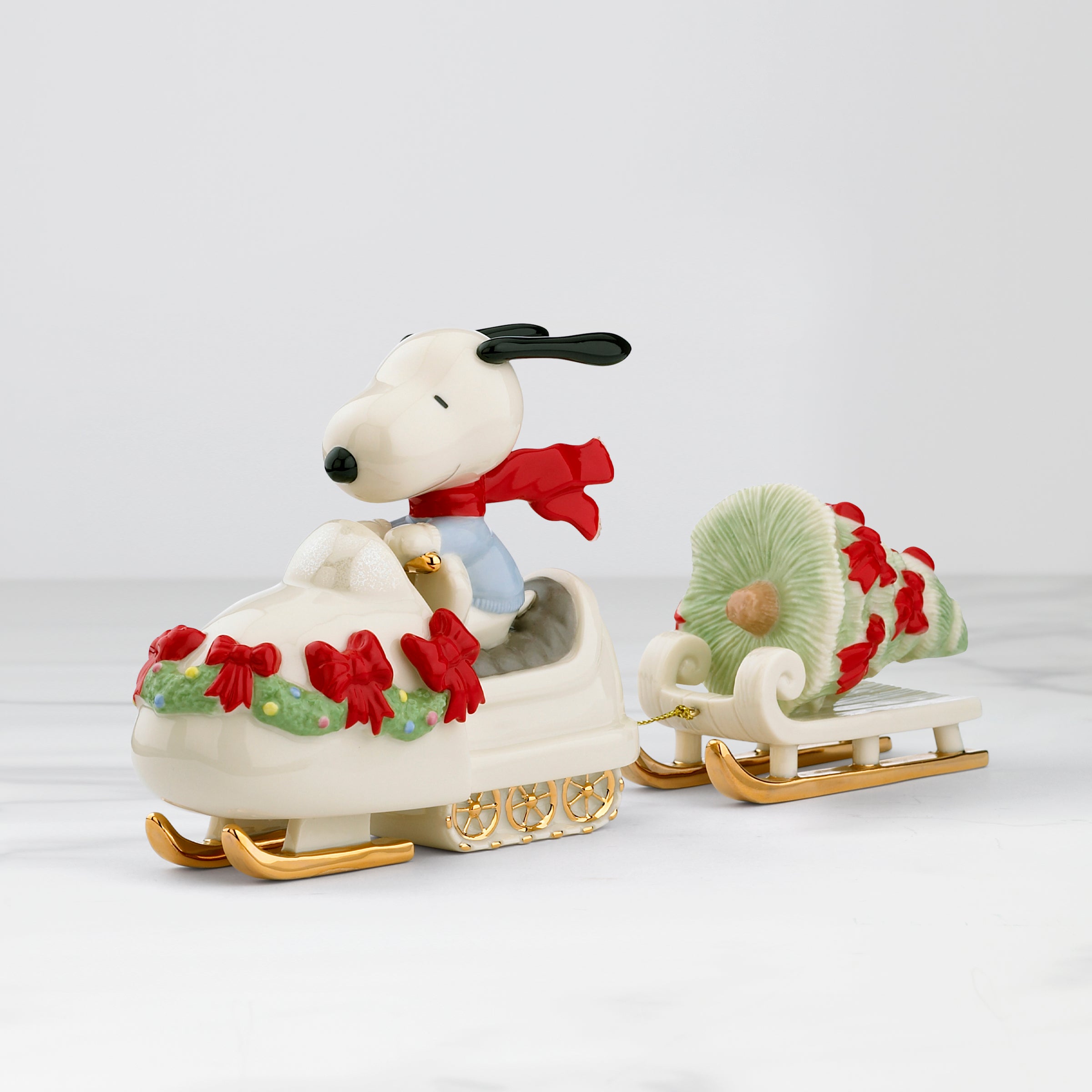 Snoopy Christmas Snowmobile Figurine with Tree