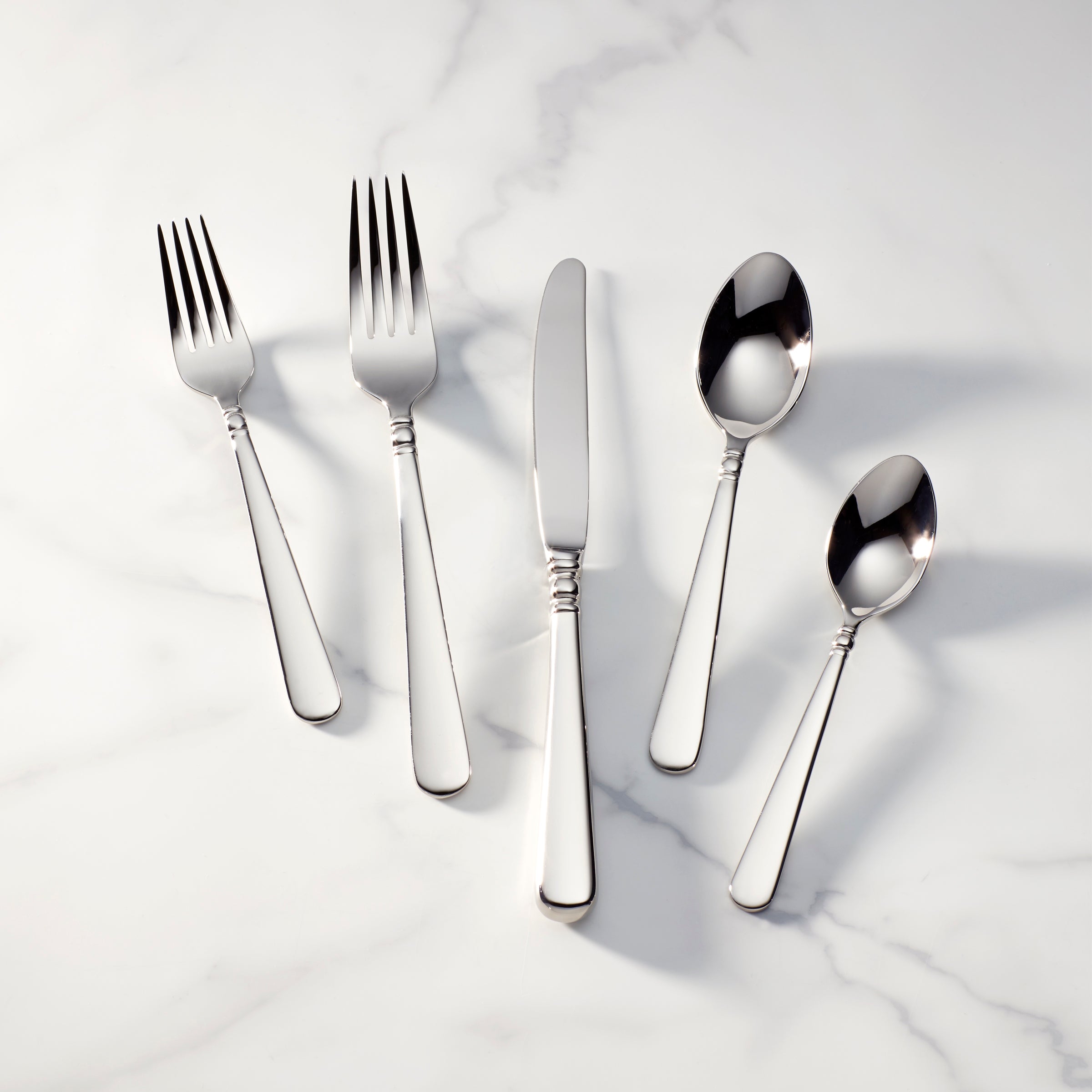 Pearl Platinum 20-Piece Stainless Steel Flatware Set with Platinum Accents