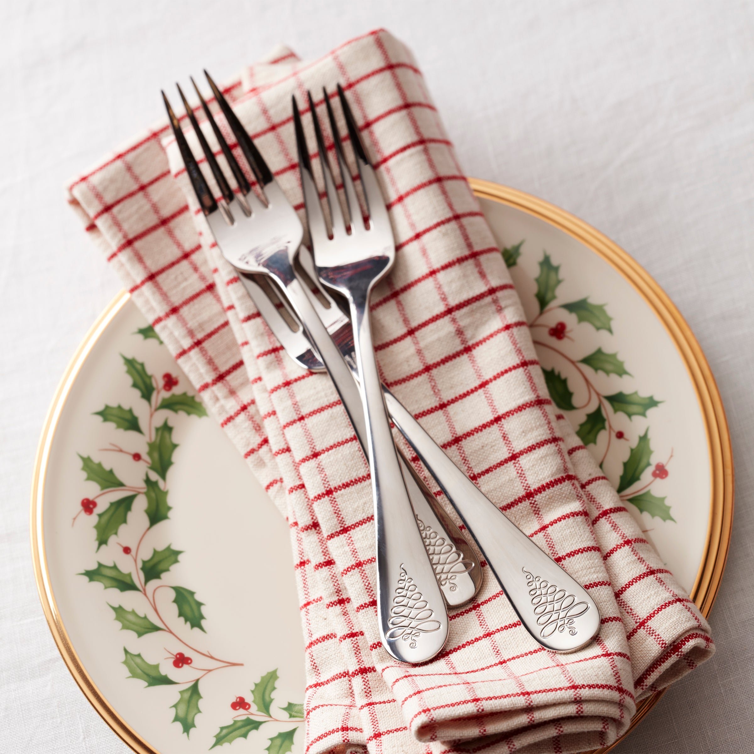 Noella 65-Piece Christmas Flatware Set with Evergreen Tree Design