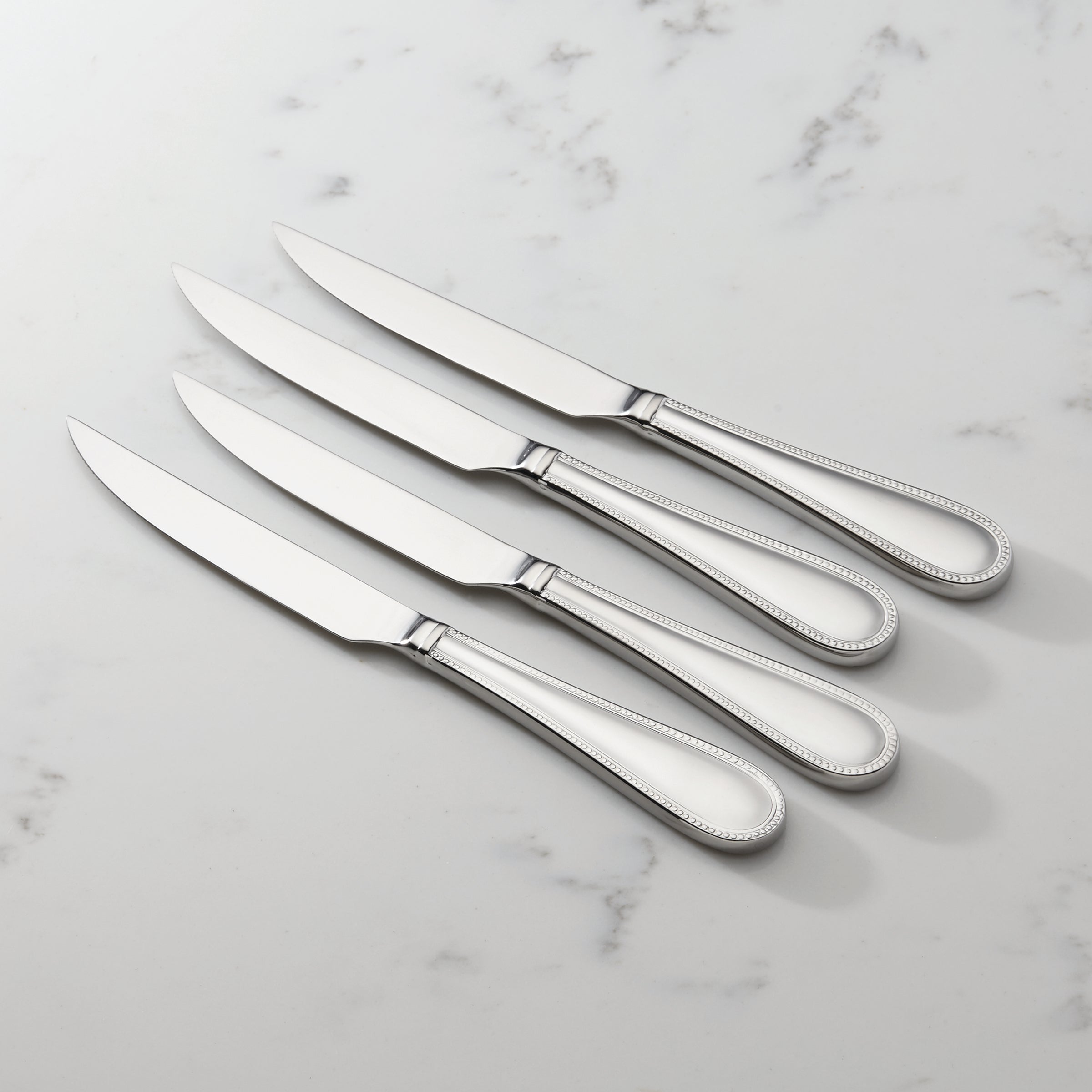 Lyndon 4-Piece Stainless Steel Steak Knife Set with Textured Handle
