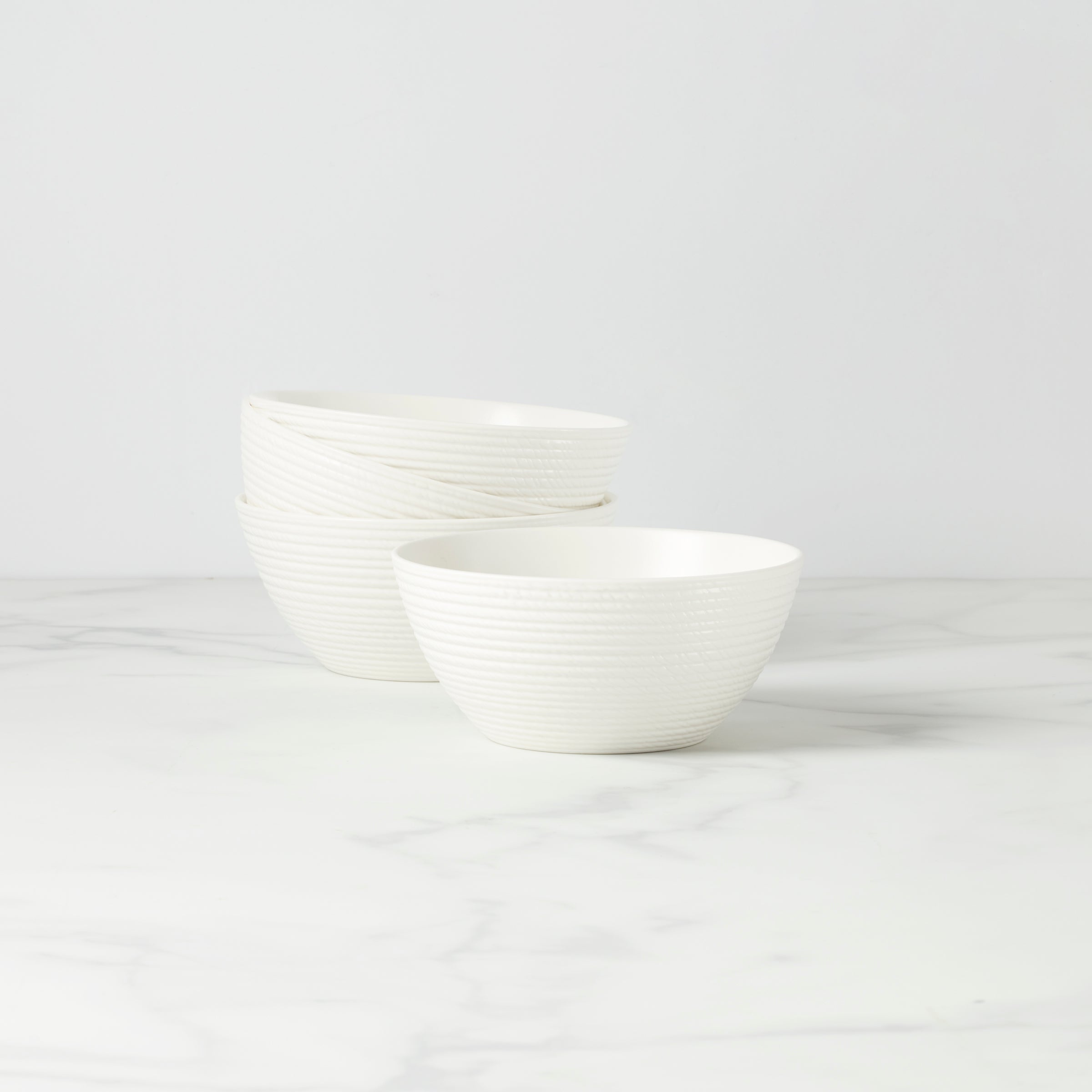 LX Collective 4-Piece White Porcelain Fruit Bowl Set - Textured Design